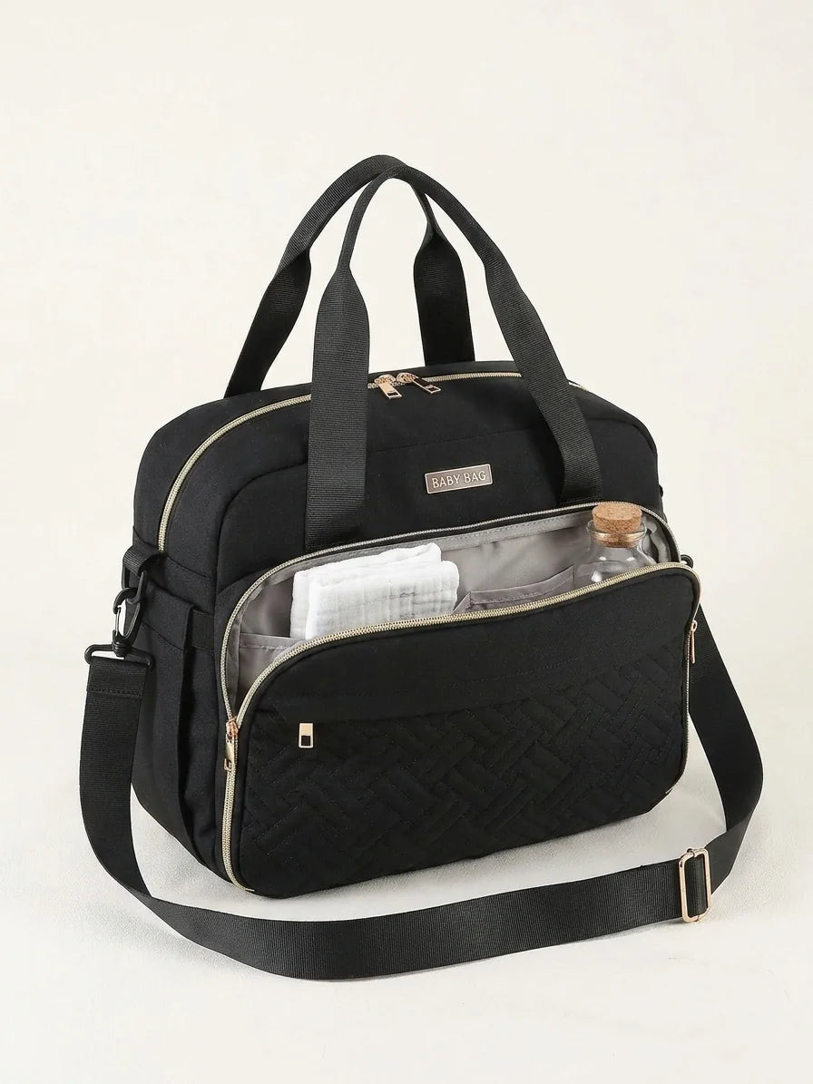 Sac à langer bandouliere isotherme deep matte black - vue de face avec compartiments ouverts