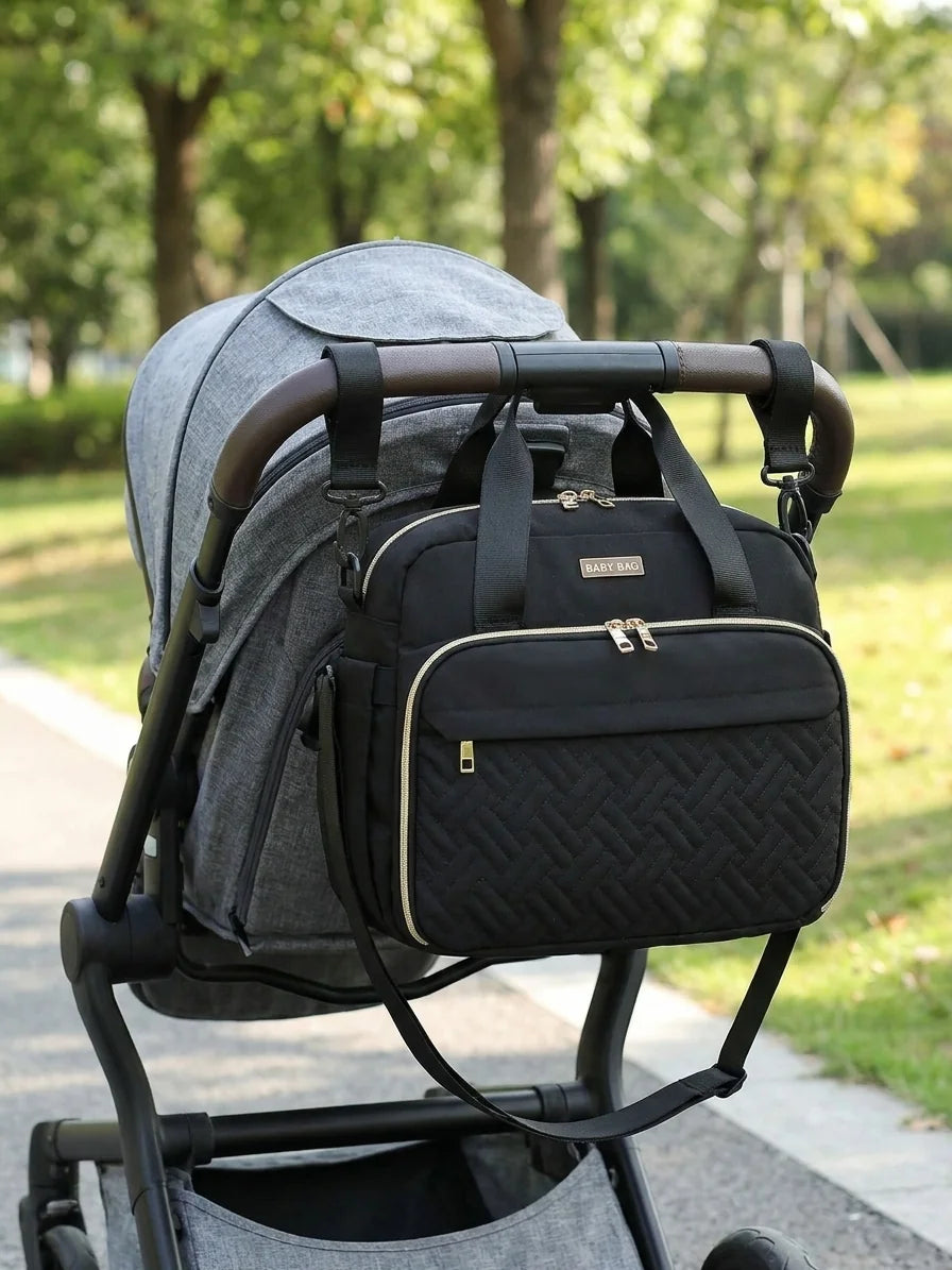Sac à langer bandouliere isotherme deep matte black - accroché à la poussette