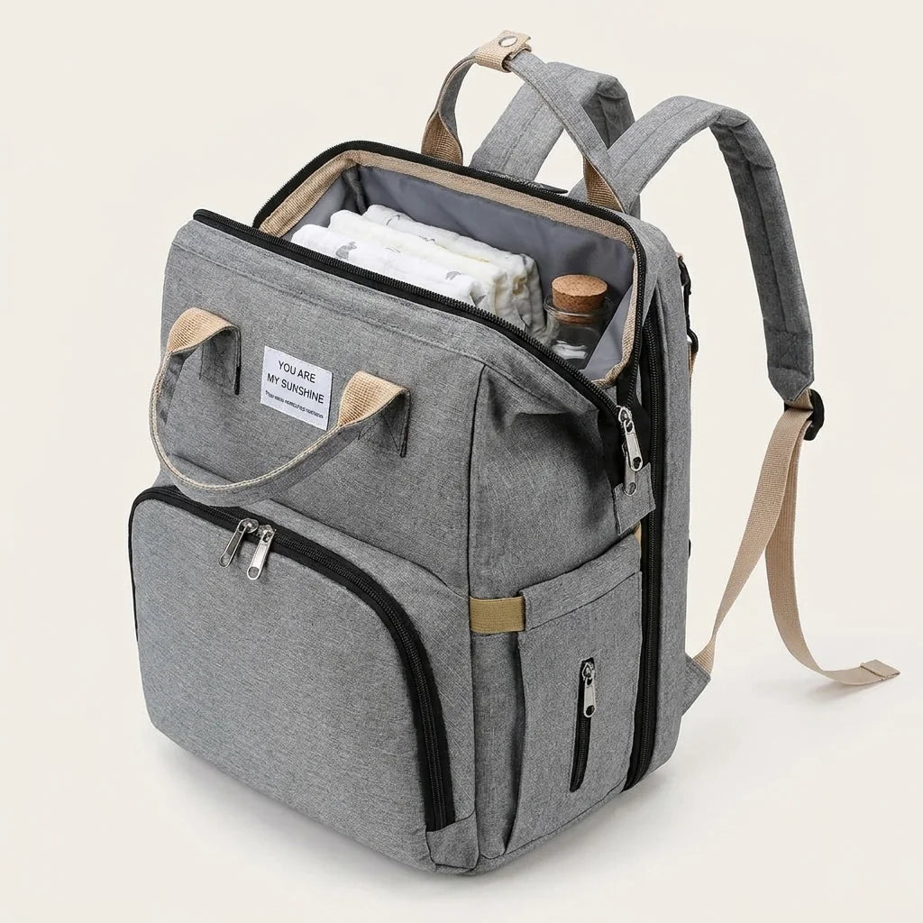 Sac à langer berceau pliable deep matte black - vue de face avec compartiments ouverts