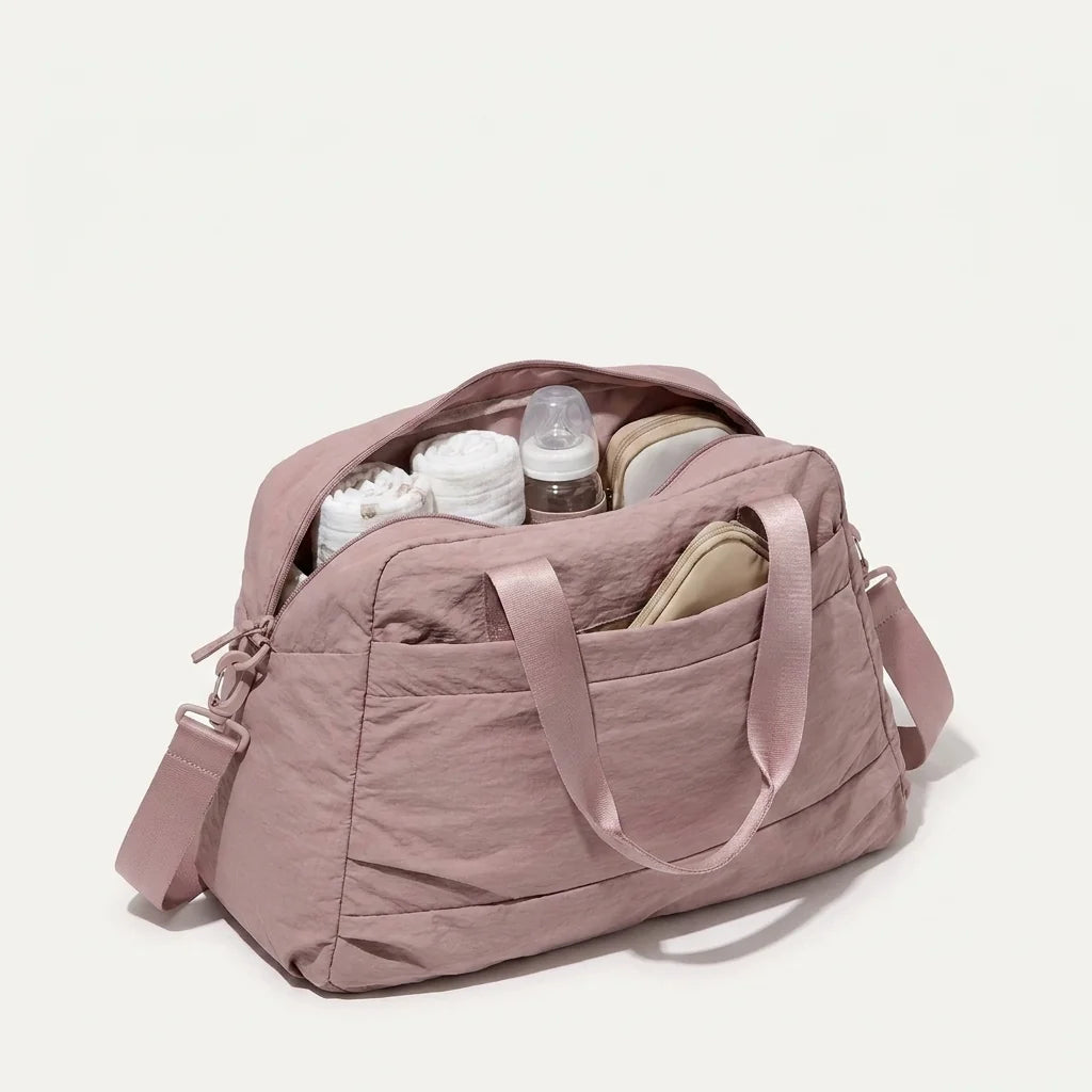 Sac à langer cabas poussette muted dusty pink - vue de face avec compartiments ouverts Image