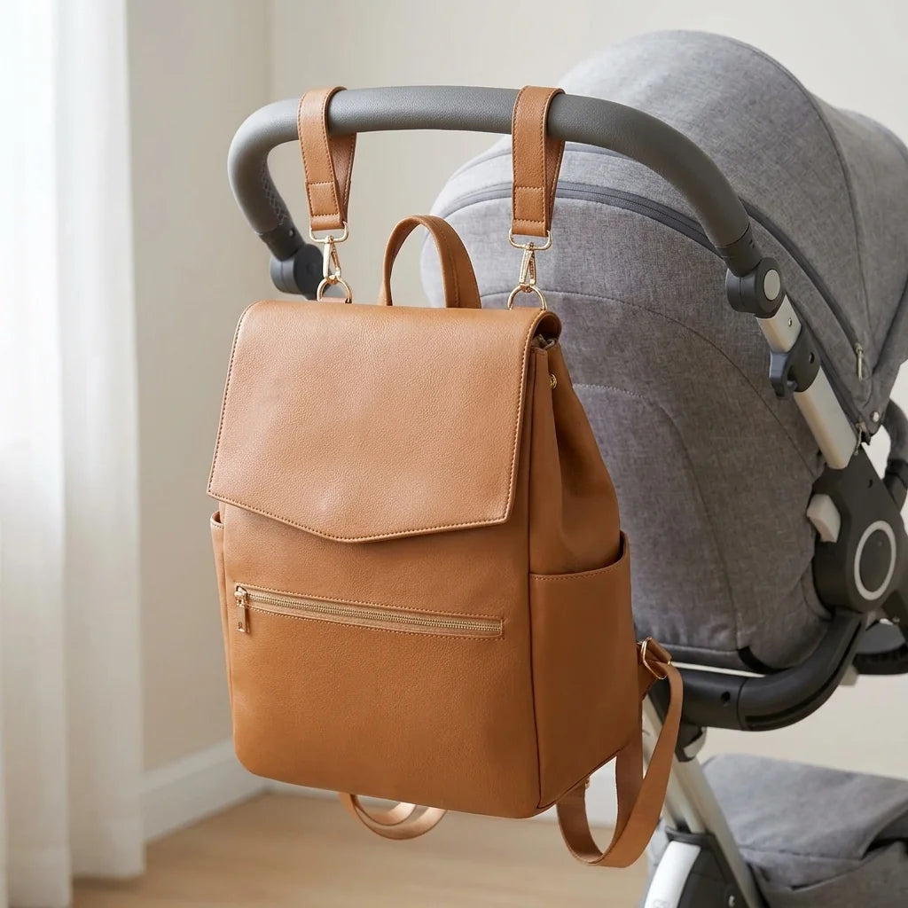 Sac à langer cuir matelas inclus warm cognac brown - accroché à la poussette