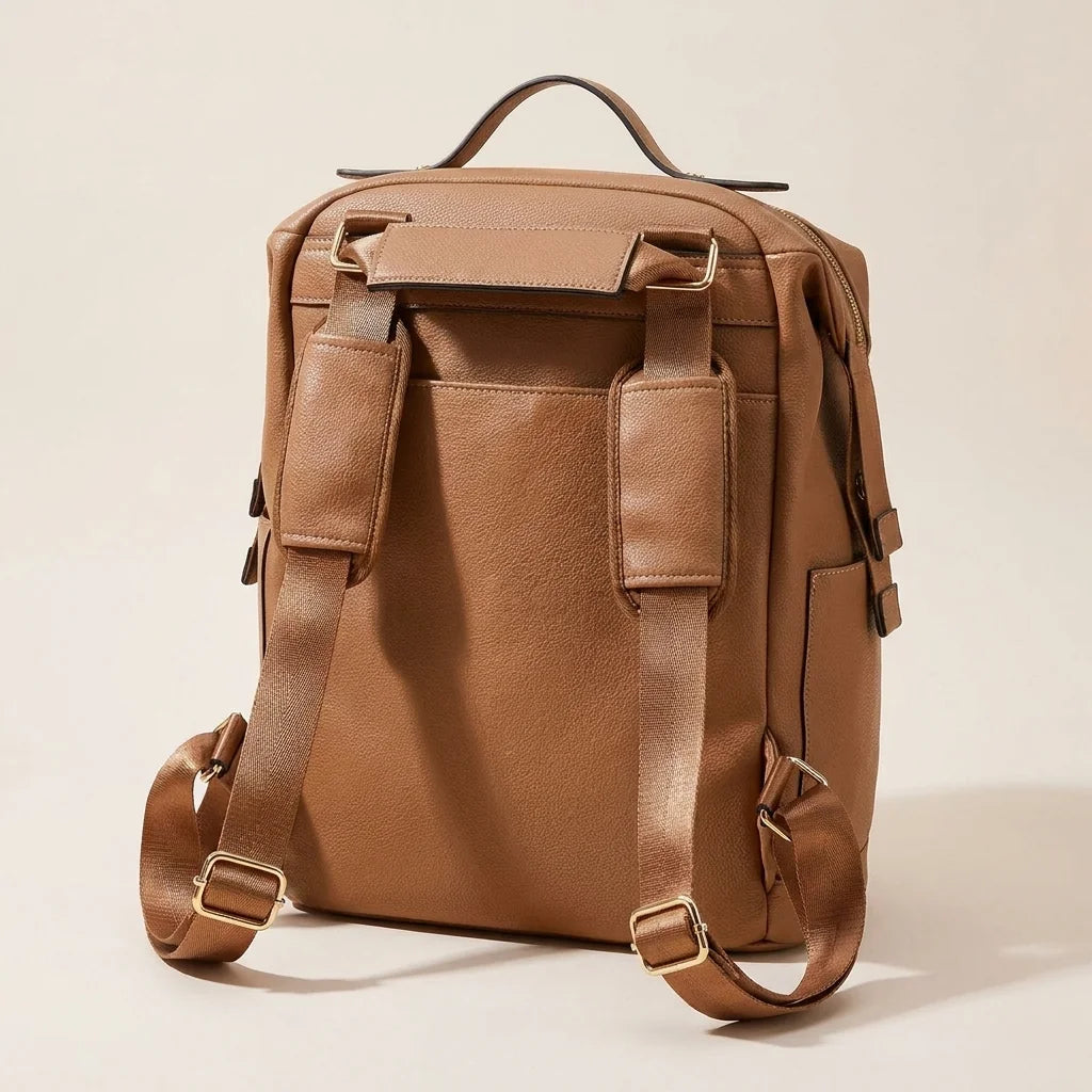Sac à langer cuir multi-poches warm cognac camel - système de portage et bretelles ergonomiques