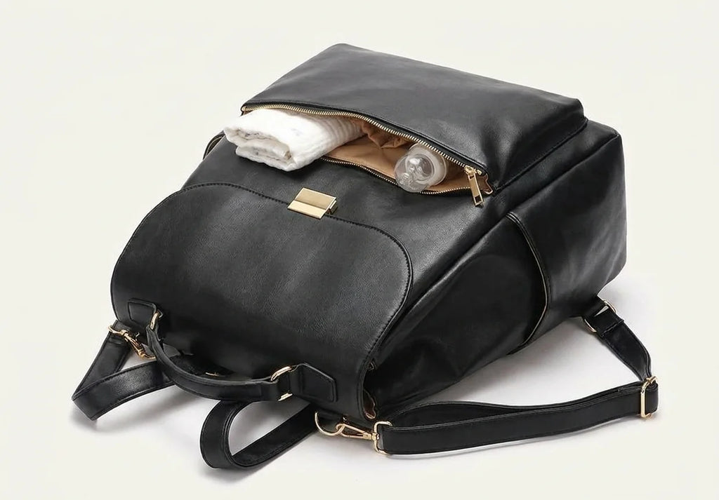 Sac à langer impermeable cuir deep matte black - vue de face avec compartiments ouverts