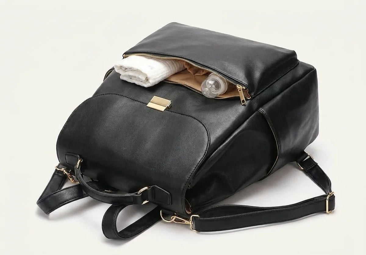 Sac à langer impermeable cuir deep matte black - vue de face avec compartiments ouverts